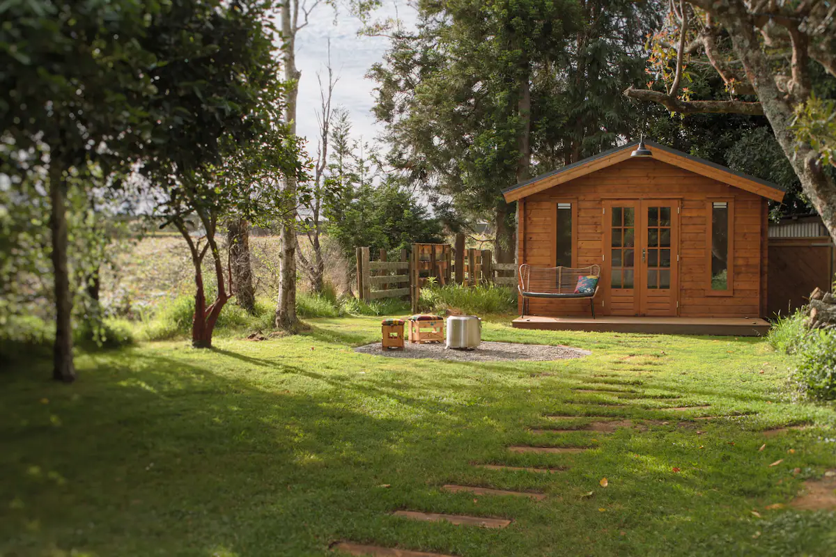 A cabin among native New Zealand trees